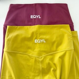 2 pairs of EQYL Flex leggings in Jam Maroon and Mustard Yellow